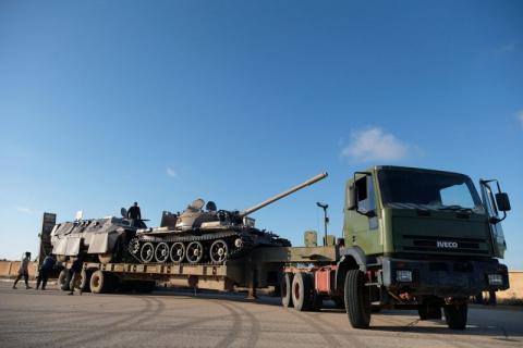 Libyan National Army (LNA) members, commanded by Khalifa Haftar, equip the military vehicles to get out of Benghazi to reinforce the troops advancing to Tripoli, in Benghazi, Libya, April 13, 2019. PHOTO BY REUTERS/Esam Omran Al-Fetori