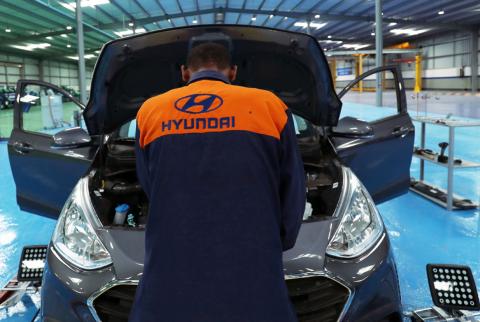 An employee assembles a Hyundai car in Hyundai Marathon Motor assembly plant on the outskirt of Addis Ababa, Ethiopia, February 21, 2019. PHOTO BY REUTERS/Tiksa Negeri