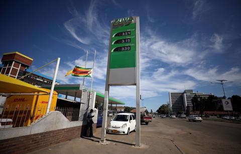 The prices of petrol, diesel and gas are shown in U.S. dollars outside a fuel station in Harare, Zimbabwe, February 23, 2019. PHOTO BY REUTERS/Mike Hutchings