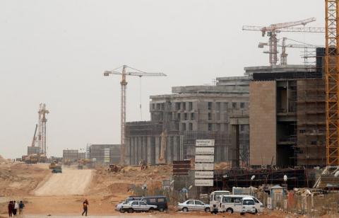 Construction machines and labourers work at the future headquarters of the Council of Ministers in the government district of the New Administrative Capital (NAC) east of Cairo, Egypt, May 2, 2019. PHOTO BY REUTERS/Amr Abdallah Dalsh