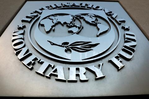 The International Monetary Fund (IMF) logo is seen outside the headquarters building in Washington, U.S., as IMF Managing Director Christine Lagarde meets with Argentine Treasury Minister Nicolas Dujovne, September 4, 2018. PHOTO BY REUTERS/Yuri Gripas