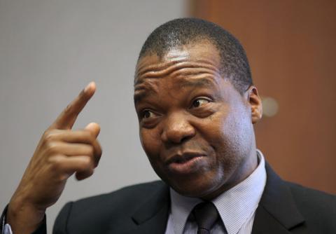 Reserve Bank of Zimbabwe Governor John Mangudya gestures during an interview in Harare, March 16, 2016. PHOTO BY REUTERS/Philimon Bulawayo 