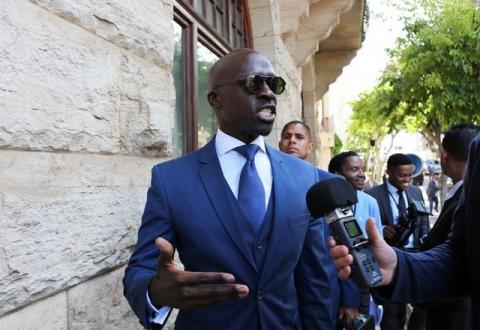 Finance Minister Malusi Gigaba speaks to members of the media after delivering his medium term budget speech in Parliament, in Cape Town, South Africa, October 25, 2017. PHOTO BY REUTERS/Sumaya Hisham