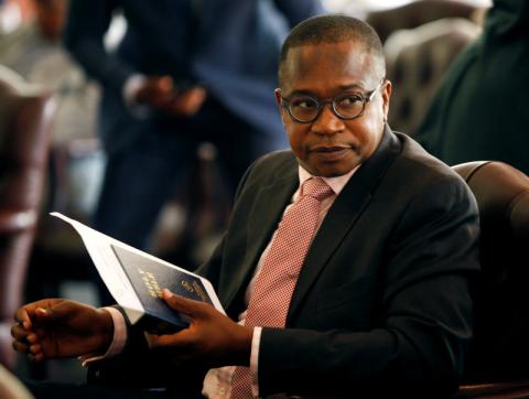 Zimbabwean Finance Minister Mthuli Ncube looks on before the swearing in of new cabinet ministers at State House in Harare, Zimbabwe, September 10, 2018. PHOTO BY REUTERS/Philimon Bulawayo