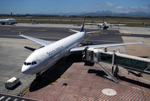 A South African Airways (SAA) aircraft is seen parked on the tarmac at Cape Town International Airport in Cape Town, South Africa, November 14, 2019. PHOTO BY REUTERS/Sumaya Hisham