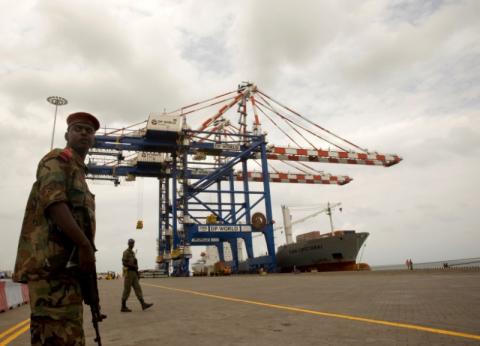 A Djibouti policeman stands guard during the opening ceremony of Dubai-based port operator DP World's Doraleh container terminal in Djibouti port, February 7, 2009. PHOTO BY REUTERS/Ahmed Jadallah