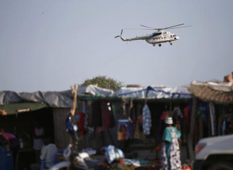 A United Nations helicopter flies over the town of Abyei 