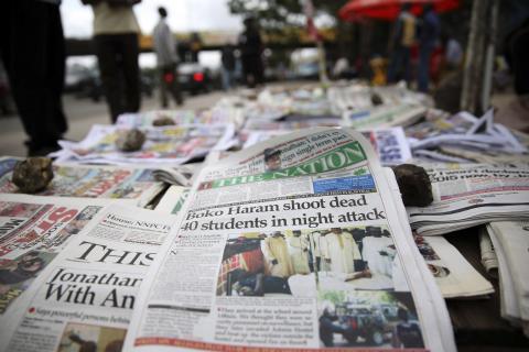 A newspaper is displayed at a vendor stand in Ikoyi district in Lagos