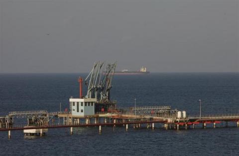 A view of pipelines and a loading berth of the Marsa al Hariga oil port in the city of Tobruk