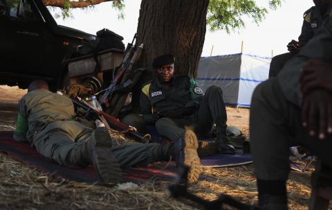 Soldiers from the African Union peacekeeping mission to Central African Republic (MISCA) rest under a tree in Bossangao, north of capital Bangui in the Central African Republic