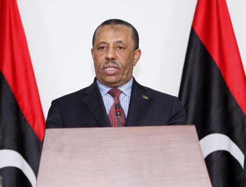 Libya's acting prime minister Abdallah al-Thinni speaks during a news conference in Tripoli