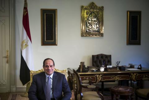 Egypt’s President Abdel Fattah al-Sisi sits in his office before a meeting with U.S. Secretary of State John Kerry at the Presidential Palace in Cairo