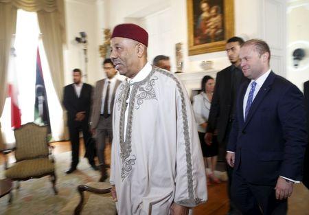 Abdullah al-Thinni (L), Prime Minister of Libya's internationally recognised government, arrives for talks with Maltese Prime Minister Joseph Muscat (R) at the Auberge de Castille in Valletta, Malta, July 1, 2015. PHOTO BY REUTERS/Darrin Zammit Lupi