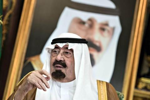 Saudi King Abdullah bin Abdul Aziz al-Saud sits before a meeting with U.S. Secretary of State John Kerry at the Royal Palace in Jeddah, September 11, 2014. PHOTO BY REUTERS/Brendan Smialowski