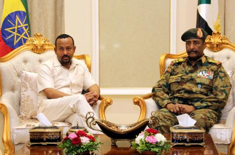 Ethiopian Prime Minister Abiy Ahmed meets Sudan's Head Of Transitional Military Council, Lieutenant General Abdel Fattah Al-Burhan Abdelrahman to mediate in the political crisis that has followed the overthrow of President Omar al-Bashir at the airport in Khartoum, Sudan, June 7, 2019. PHOTO BY REUTERS/Mohamed Nureldin Abdallah