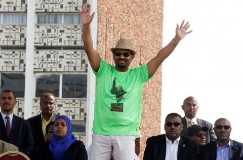 Ethiopian Prime Minister Abiy Ahmed waves to supporters as he attends a rally in Addis Ababa, Ethiopia, June 23, 2018. PHOTO BY REUTERS/Stringer