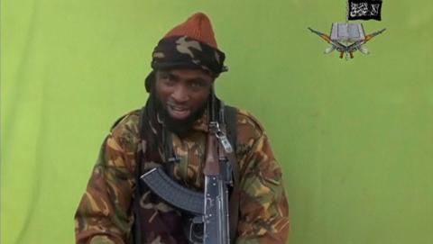 Boko Haram leader Abubakar Shekau speaks at an unknown location in this still image taken from an undated video released by Nigerian Islamist rebel group Boko Haram. PHOTO BY REUTERS/Boko Haram handout via Reuters TV