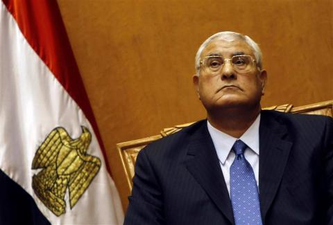 Adli Mansour, Egypt's chief justice and head of the Supreme Constitutional Court, attends his swearing in ceremony as the nation's interim president