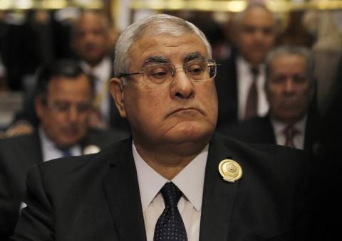 Egypt's interim president Adly Mansour attends the 25th Arab Summit in Kuwait City