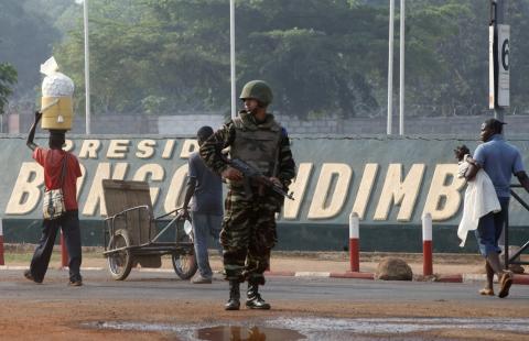 A Moroccan soldier from the peacekeeping forces secures a street in Bangui