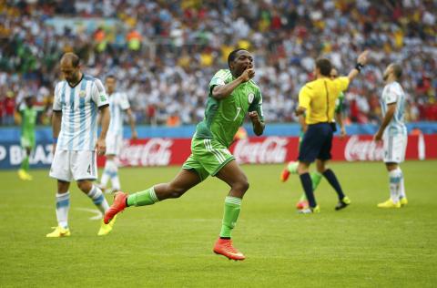 Nigeria's Ahmed Musa celebrates after scoring his team's second goal against Argentina during their 2014 World Cup Group F soccer match at the Beira Rio stadium in Porto Alegre