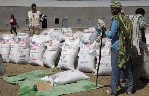 A farmer waits to receive emergency food aid in the village of Estayish in Ethiopia's northern Amhara region, February 11, 2016. PHOTO BY REUTERS/Katy Migiro