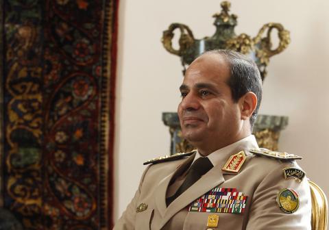 Egypt's Army Chief General Abdel Fattah al-Sisi attends a meeting with Egypt's interim President Adly Mansour, Russia's Defence Minister Sergei Shoigu and Foreign Minister Sergei Lavrov (not pictured) at El-Thadiya presidential palace