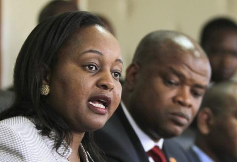 Kenya's minister for devolution and planning, Anne Waiguru (L), presides over a bank product launch in Nairobi, August 26, 2015. PHOTO BY REUTERS/Noor Khamis