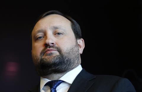 Ukraine's First Deputy Prime Minister Serhiy Arbuzov waits for a meeting with European Enlargement Commissioner Stefan Fule (unseen) at the EU Commission headquarters in Brussels