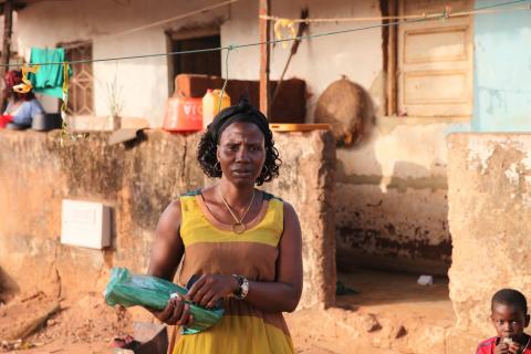 Arminda Sa poses for a photo outside her home in Bissau, Guinea-Bissau, February 6, 2019. PHOTO BY Thomson Reuters Foundation/Nellie Peyton