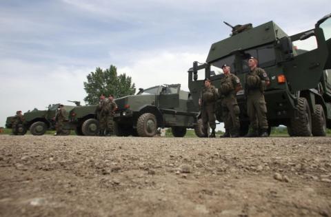 Members of the EU-Battlegroup wait for Austrian Defence Minister Norbert Darabos as he visits their barracks in Mautern about 60 kilometres (38miles) west of Vienna, May 11, 2012. PHOTO BY REUTERS/Leonhard Foeger