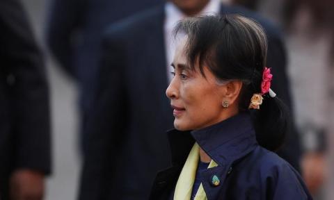 Myanmar's State Counsellor Aung San Suu Kyi walks towards her car after arriving at Air Force Station Palam in New Delhi, India, January 24, 2018. PHOTO BY REUTERS/Adnan Abidi