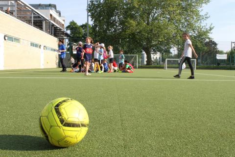 Girls attend a weekly football practice session in a community sports centre in Camden, central London, Britain, May 15, 2019. PHOTO BY THOMSON REUTERS FOUNDATION/Lin Taylor