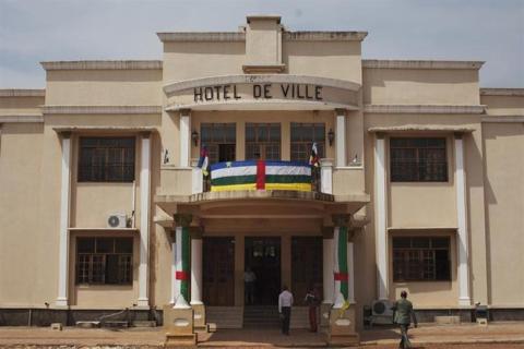 People walk outside the City Hall building in Bangui, Central African Republic