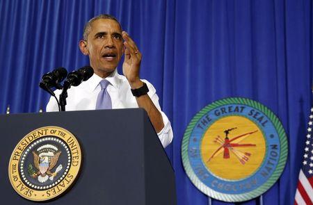 U.S. President Barack Obama speaks on expanding economic opportunity for communities across the country during a visit to a high school in Oklahoma. PHOTO BY REUTERS/Kevin Lamarque