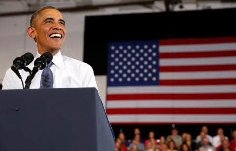 U.S. President Barack Obama smiles as he speaks at a campaign event for U.S. Rep. Mike Michaud, who is running for Governor of Maine, while at the Portland Expo in Maine, October 30, 2014. PHOTO BY REUTERS/Larry Downing