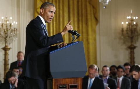 U.S. President Barack Obama addresses reporters during a news conference in the East Room of the White House in Washington, November 5, 2014. PHOTO BY REUTERS/Kevin Lamarque 