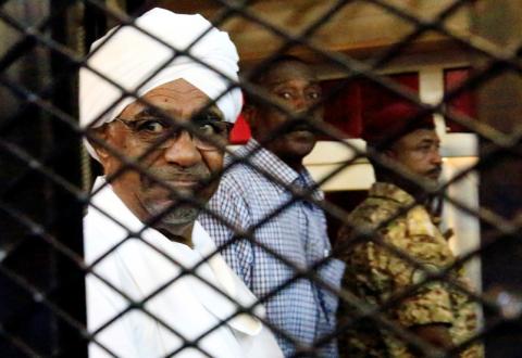 Sudan's former president Omar Hassan al-Bashir sits inside a cage at the courthouse where he is facing corruption charges, in Khartoum, Sudan, August 31, 2019. PHOTO BY REUTERS/Mohamed Nureldin Abdallah