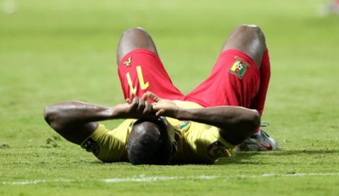 Cameroon's Christian Bassogog looks dejected after the match. PHOTO BY REUTERS/Suhaib Salem