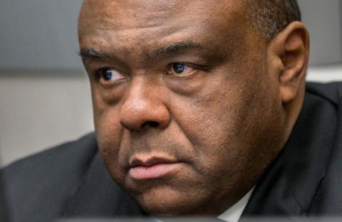 Jean-Pierre Bemba Gombo is seen in a court room of the ICC to hear the delivery of the judgment on charges including corruptly influencing witnesses by giving them money and instructions to provide false testimony and false evidence, in the Hague, the Netherlands, March 21, 2016. PHOTO BY REUTERS/Jerry Lampen