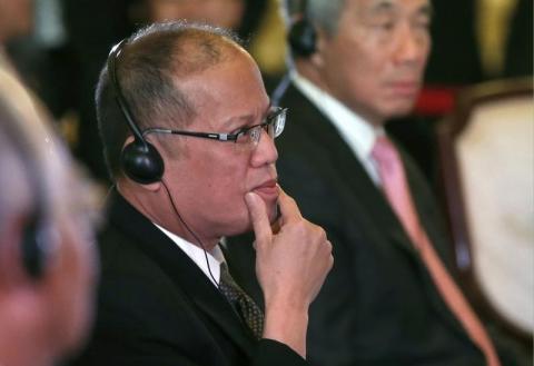 Philippine President Benigno Aquino attends the first session of the ASEAN-Japan Commemorative Summit Meeting at the state guest house in Tokyo