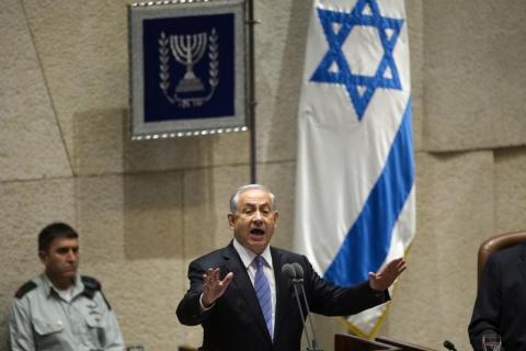 Israel's Prime Minister Benjamin Netanyahu speaks at the opening of the winter session of the Knesset, the Israeli parliament, in Jerusalem, October 27, 2014. PHOTO BY REUTERS/Ronen Zvulun