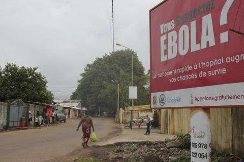 A billboard with a message about Ebola is seen on a street in Conakry, Guinea in this October 26, 2014 file photo. PHOTO BY REUTERS/Michelle Nichols