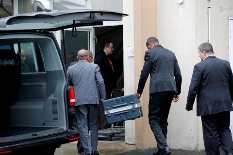 Men unload a case from a diplomatic car from the Ethiopian Embassy outside the headquarters of France's BEA air accident investigation agency in Le Bourget, north of Paris, France, March 14, 2019. The black boxes from the crashed Ethiopian Airlines Boeing 737 MAX 8 arrived in France on Thursday. PHOTO BY REUTERS/Philippe Wojazer