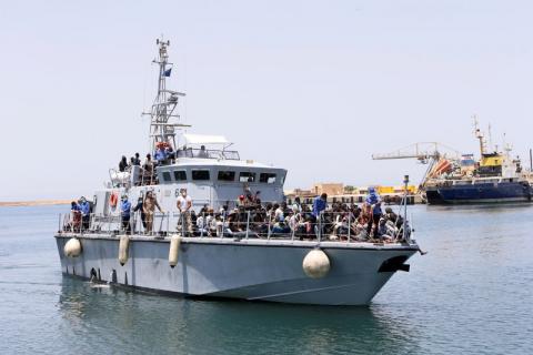 A Libyan Navy boat with migrants on board arrives at a naval base in Tripoli, Libya, June 29, 2018. PHOTO BY REUTERS/Ismail Zitouny