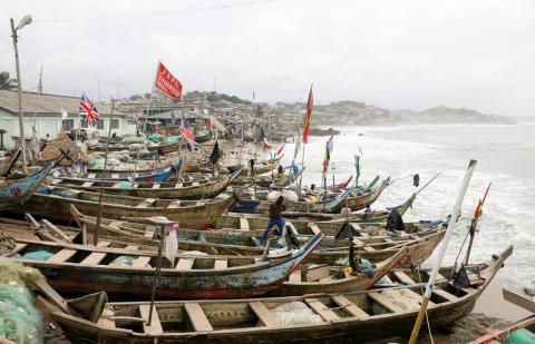 British and American flags are among other flags hoisted on fishermen's boats at the Cape Coast Castle in Ghana, July 28, 2019. PHOTO BY REUTERS/Siphiwe Sibeko