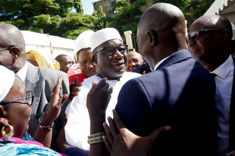 Bocary Treta, campaign manager for Malian President Ibrahim Boubacar Keita, celebrates with supporters at the Rally for Mali (RPM) party's headquarters in Bamako, Mali, August 16, 2018. PHOTO BY REUTERS/Luc Gnago