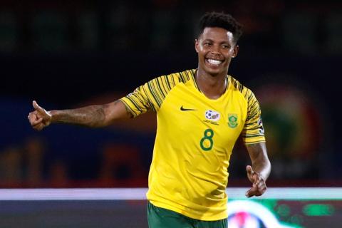 South Africa's Bongani Zungu celebrates scoring their first goal. PHOTO BY REUTERS/Amr Abdallah Dalsh