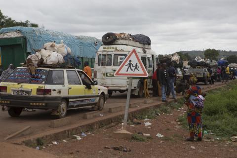 Cars line up to enter Guinea from Mali at the border in Kouremale