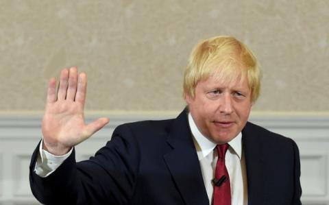 Vote Leave campaign leader, Boris Johnson, waves as he finishes delivering his speech in London, Britain June 30, 2016. PHOTO BY REUTERS/Toby Melville